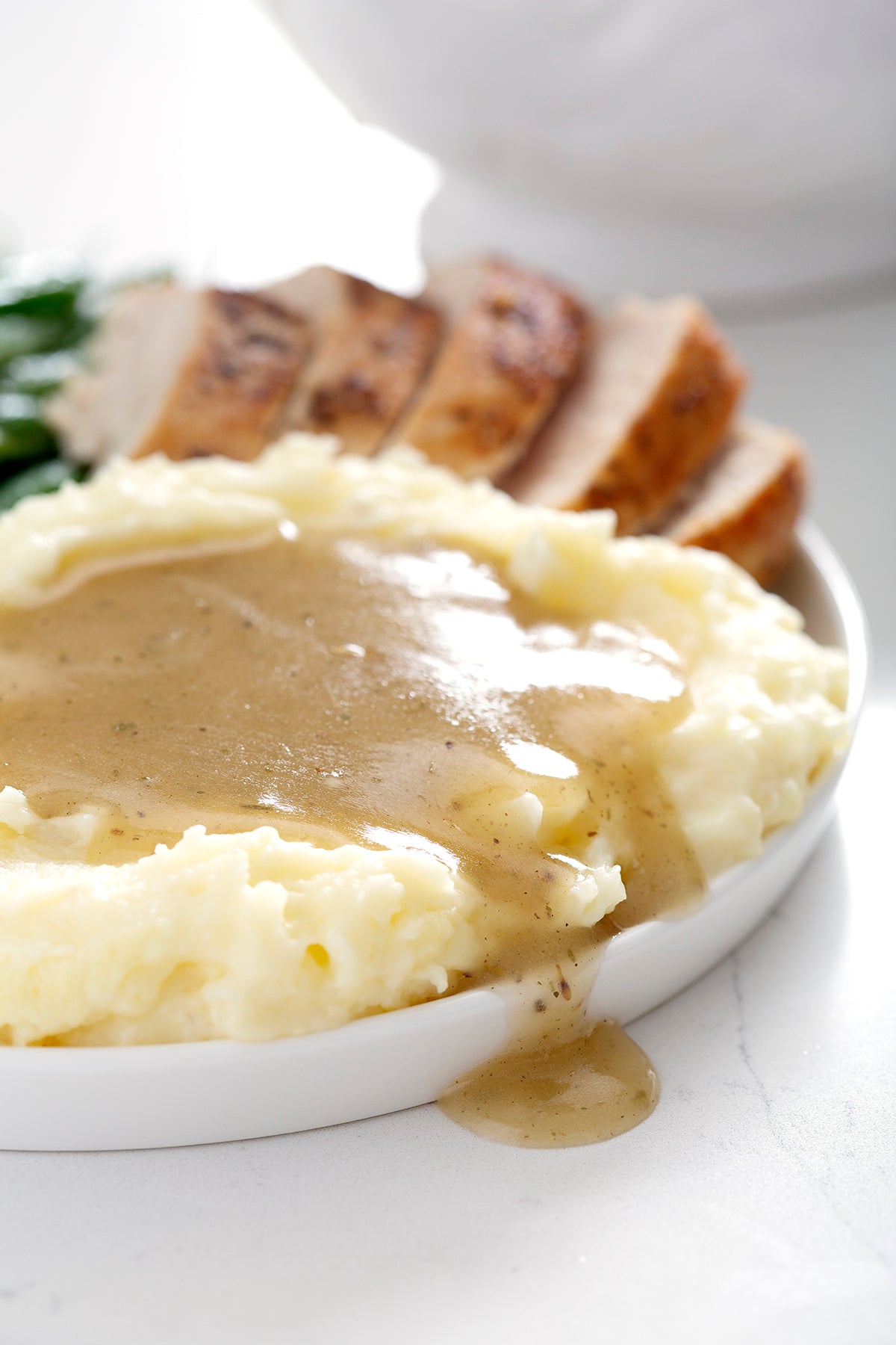 close up of gluten free gravy on mashed potatoes