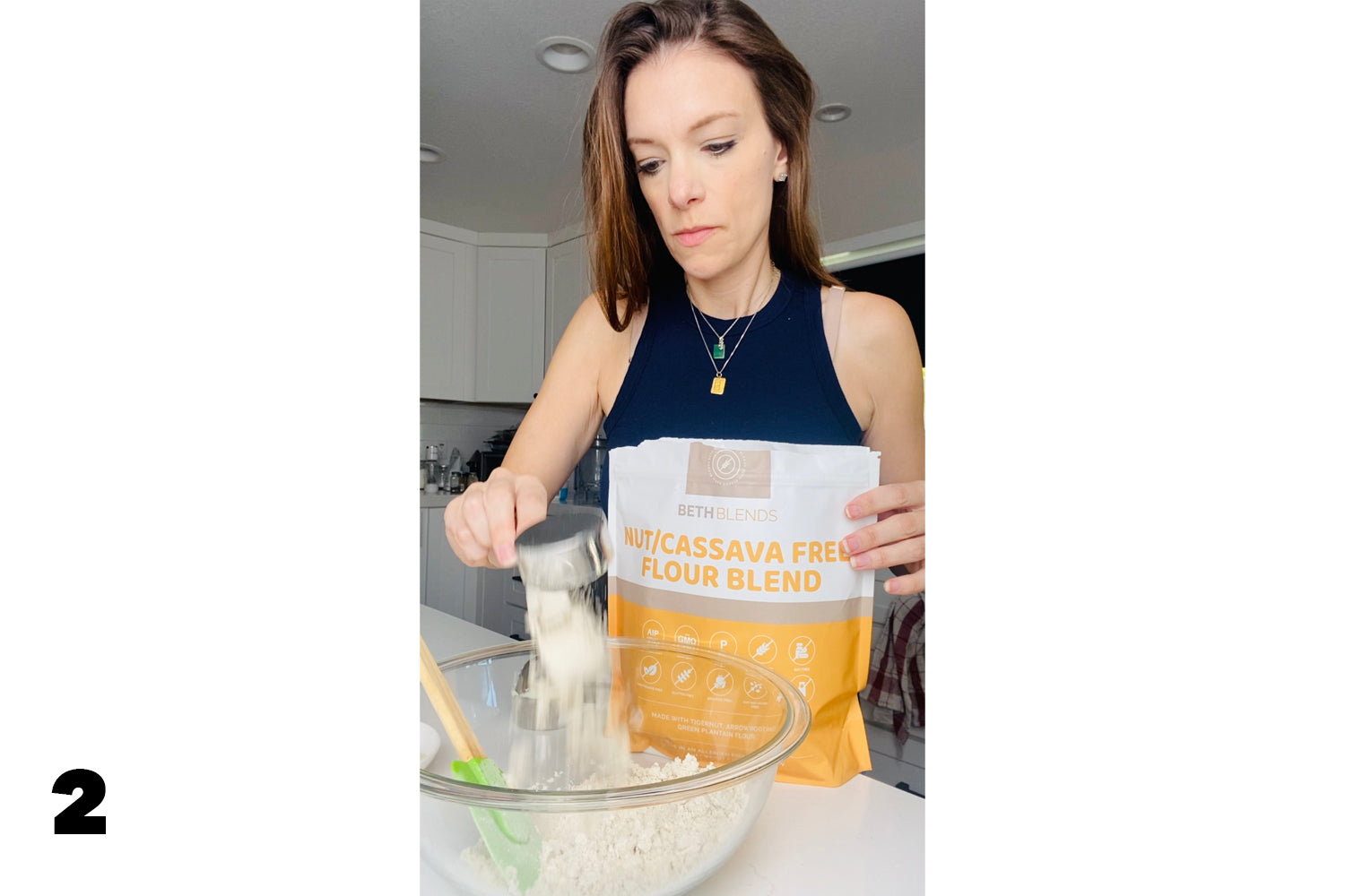 woman with bag of flour putting flour into glass bowl