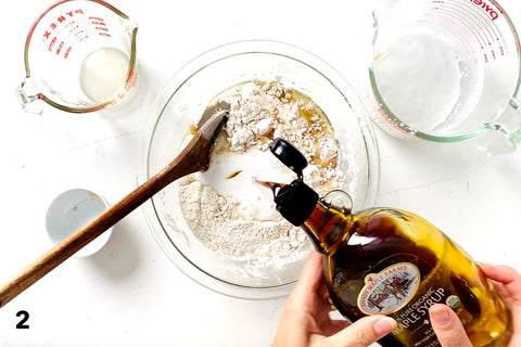 mixing wet ingredients into bowl for Fluffy AIP Pancakes