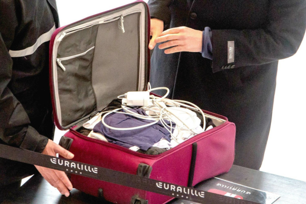 Bringing tweezers in checked luggage