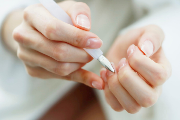 Using a cuticle pusher for gentle