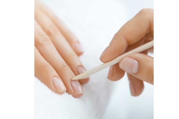 Instructions on the steps to push back cuticles
