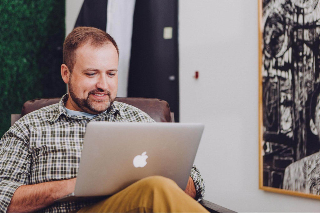 a man using-a laptop