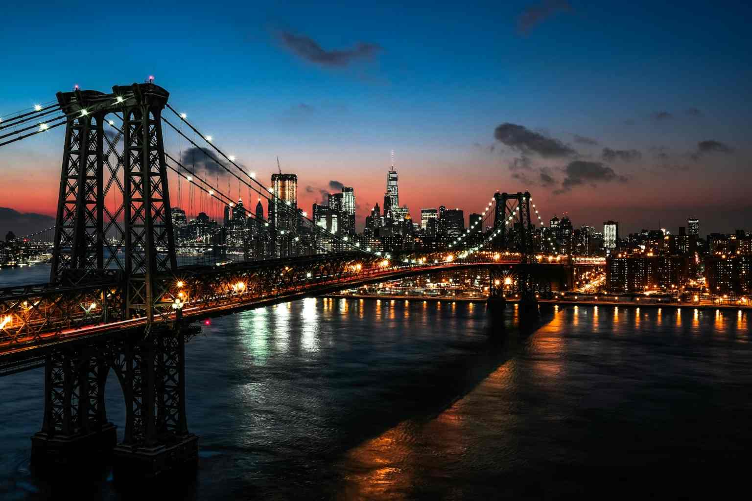 Aerial view of the Williamsburg Bridge in New York City at sunset