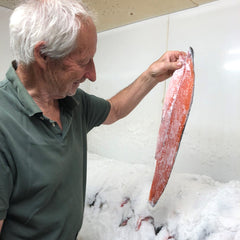 Bill Pinney curing salmon before adding to the smoker