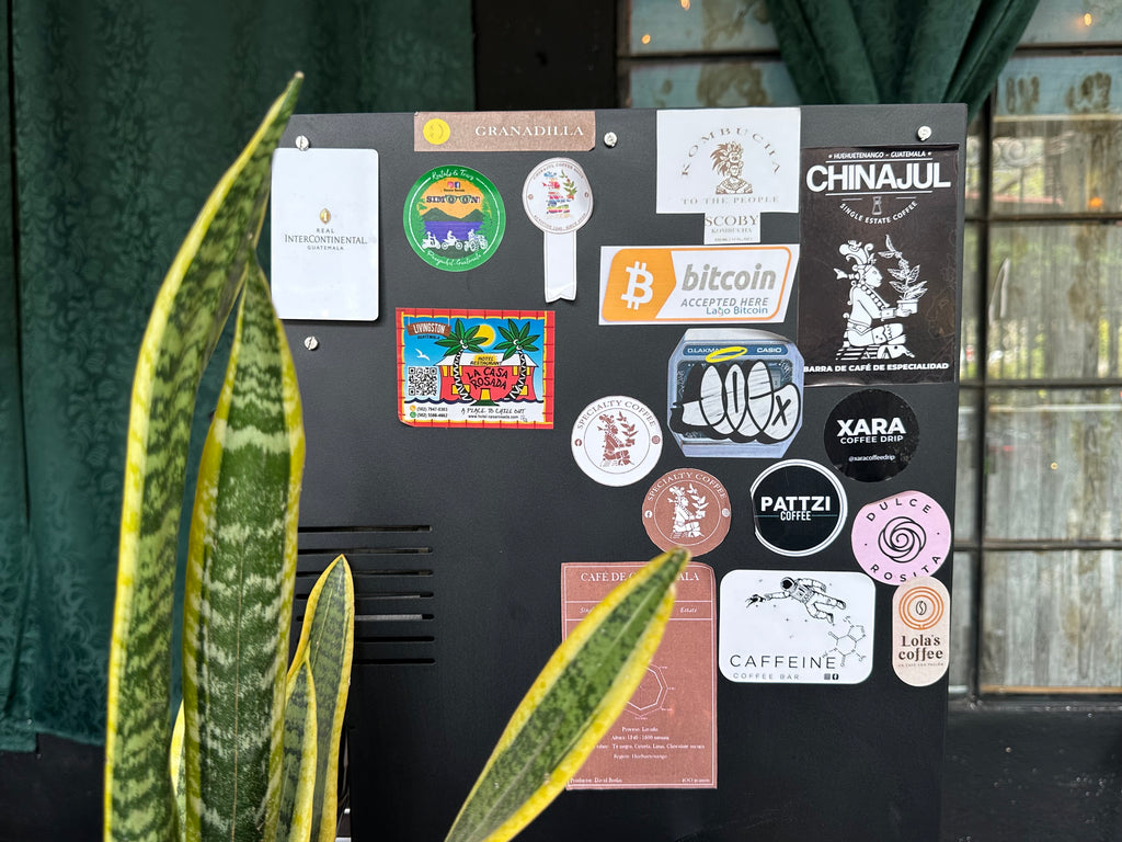 Picture taken at a cafe in Panajachel, also known as Bitcoin Lake, showing stickers people left and one that says Bitcoin