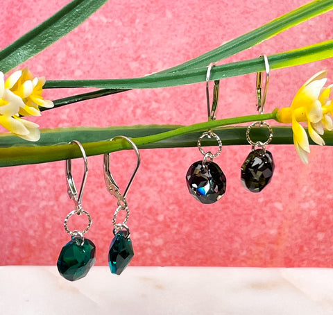 Minimal dark green Swarovski crystal drop earrings with sterling silver details and minimal black Swarovski crystal drop earrings with sterling silver details.