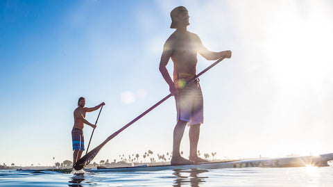 people paddle boarding