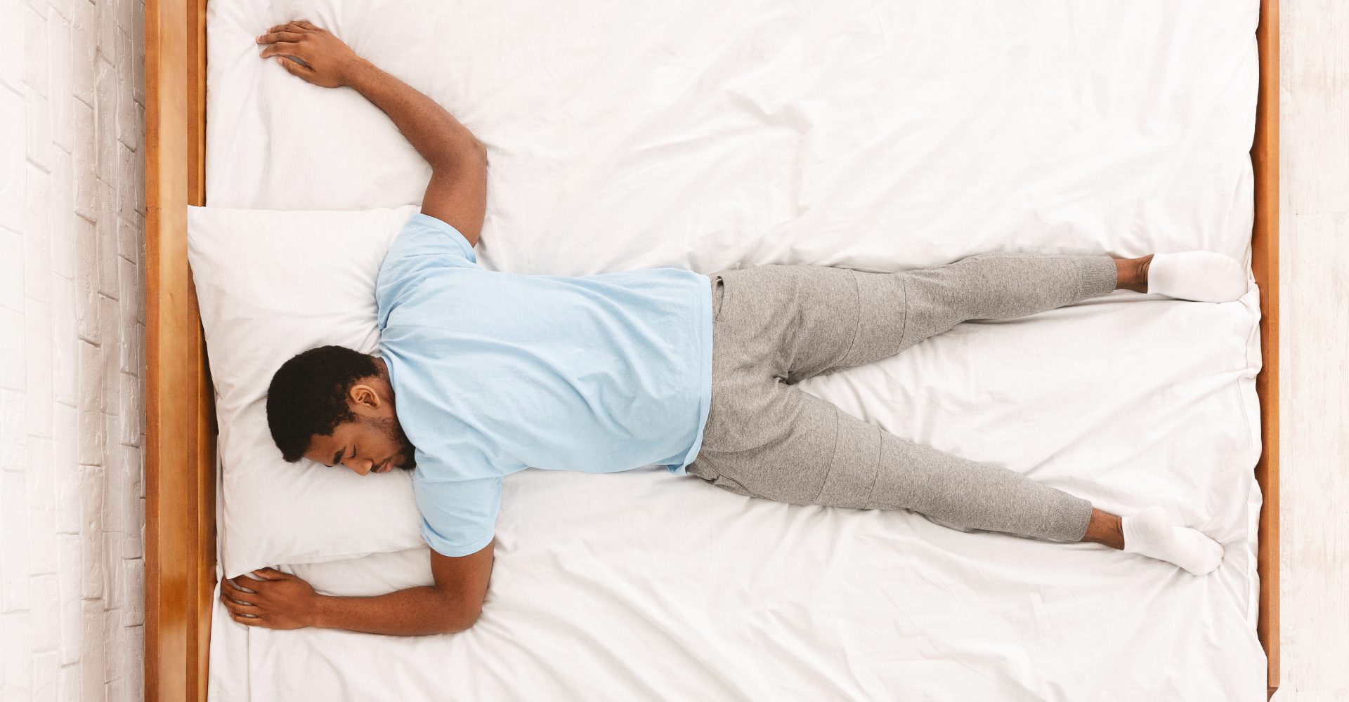 view from above, man lying on his stomach, spread out