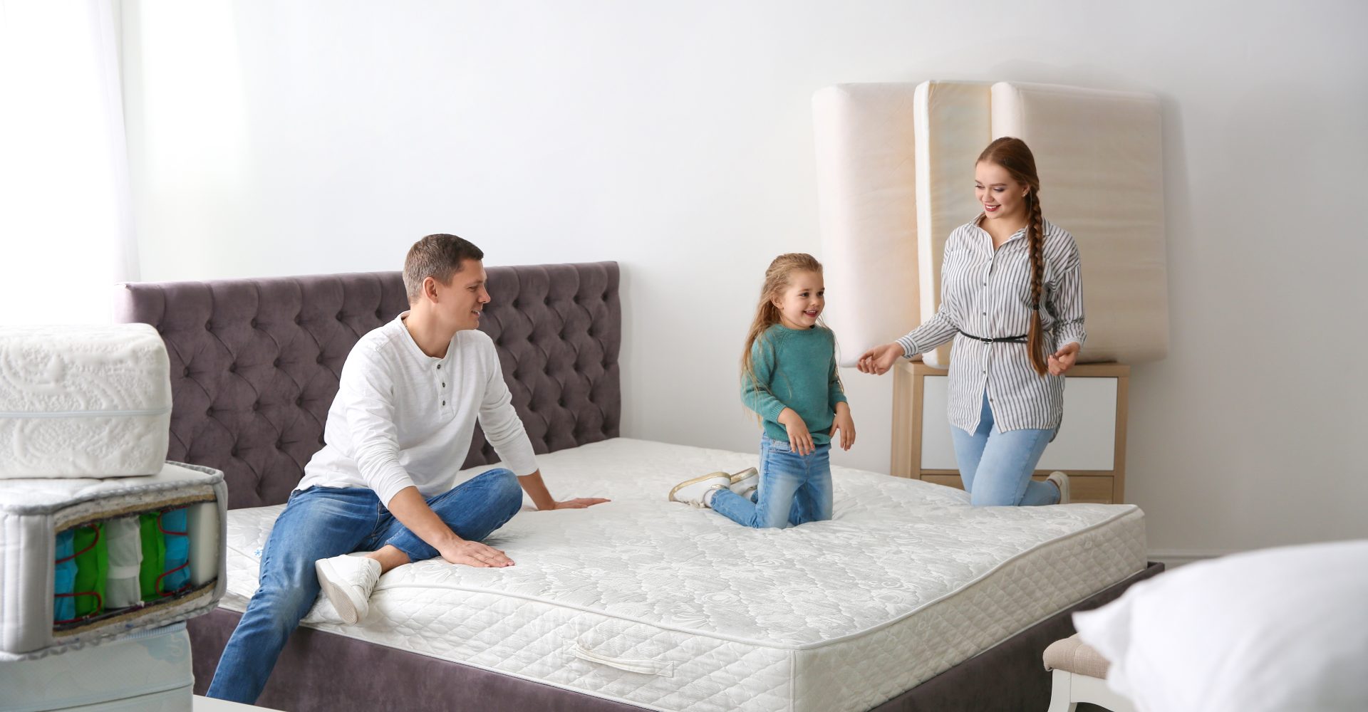 a family selecting a mattress