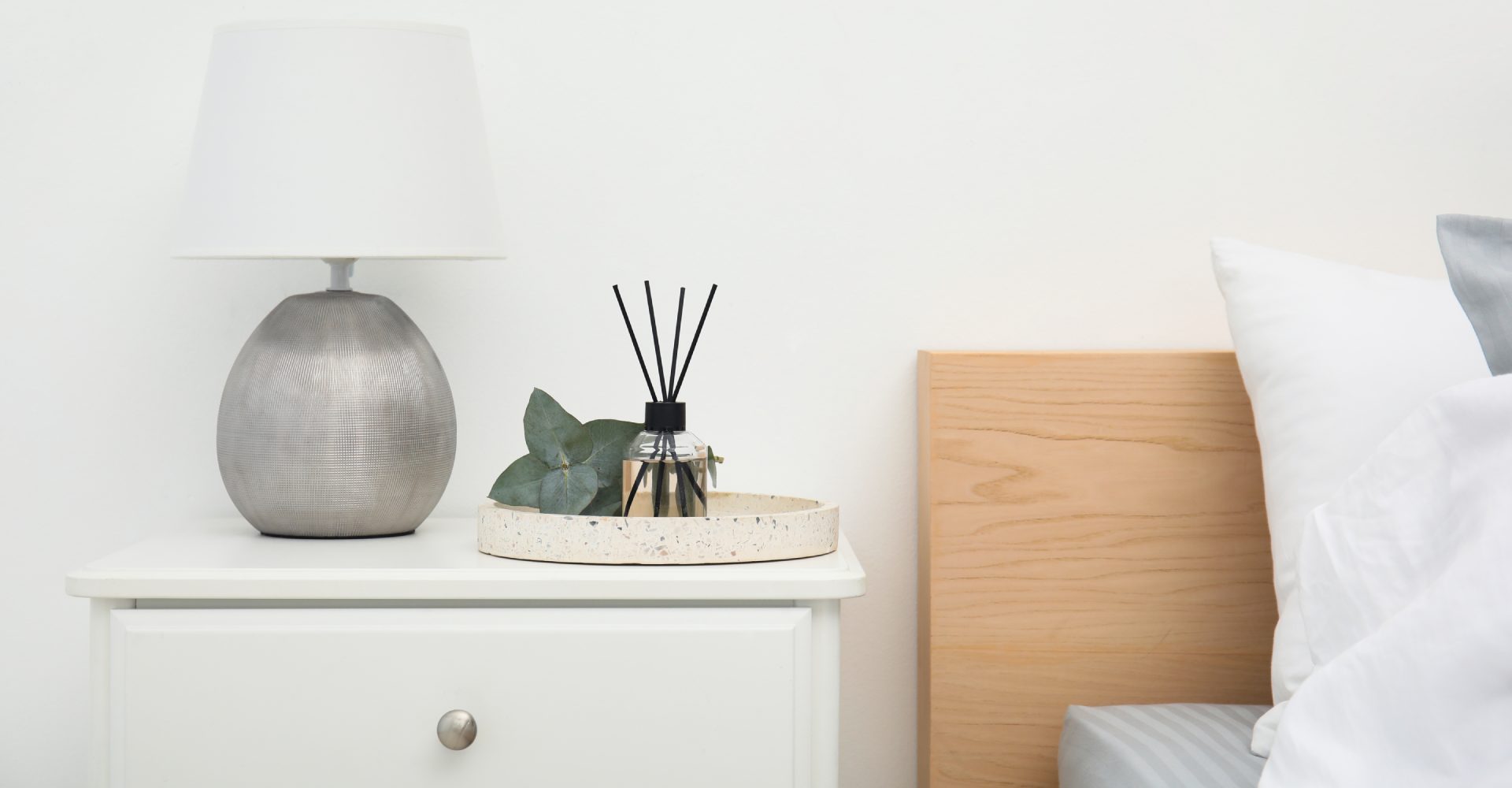 incense sticks near bed table