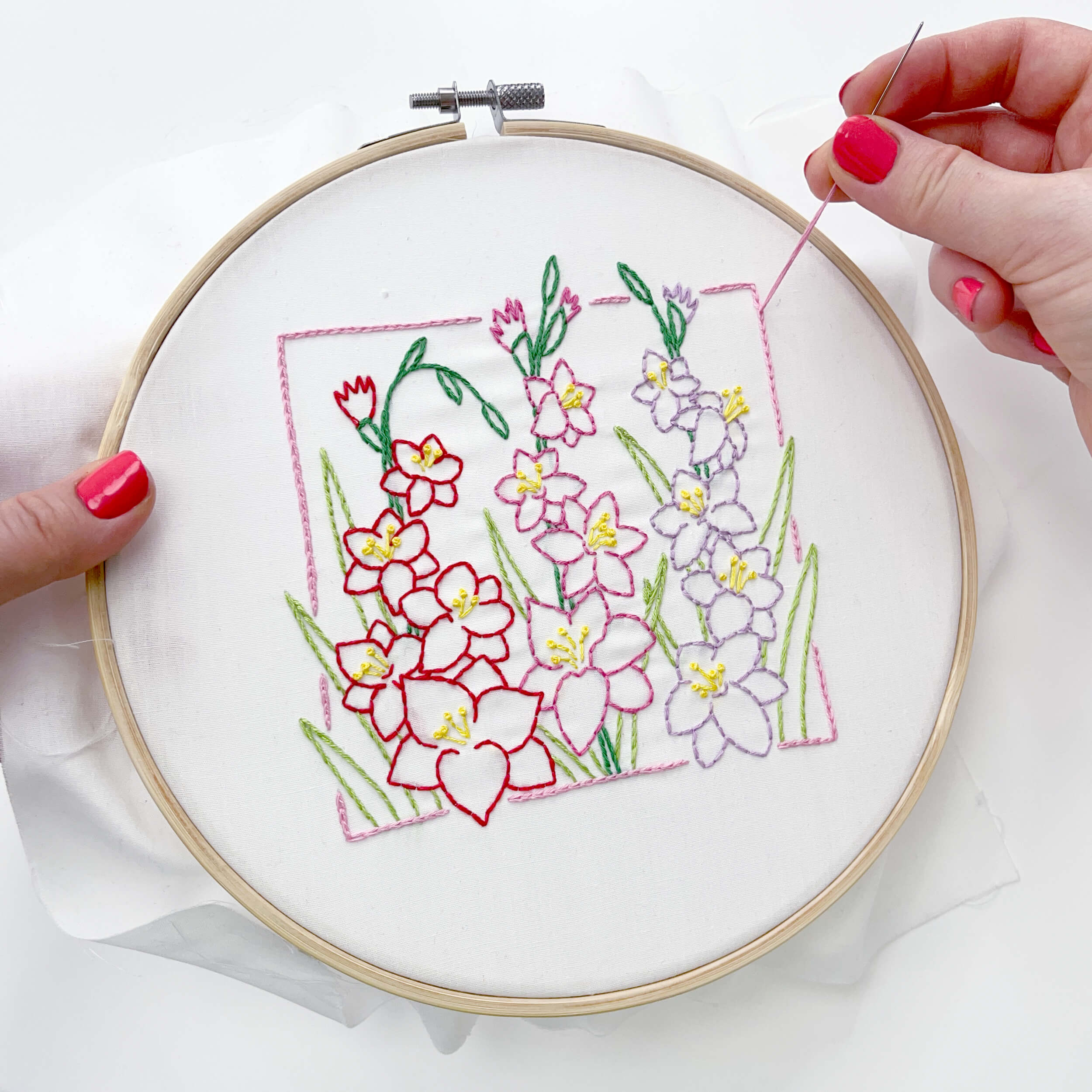 Hand stitching the gladiolus embroidery pattern