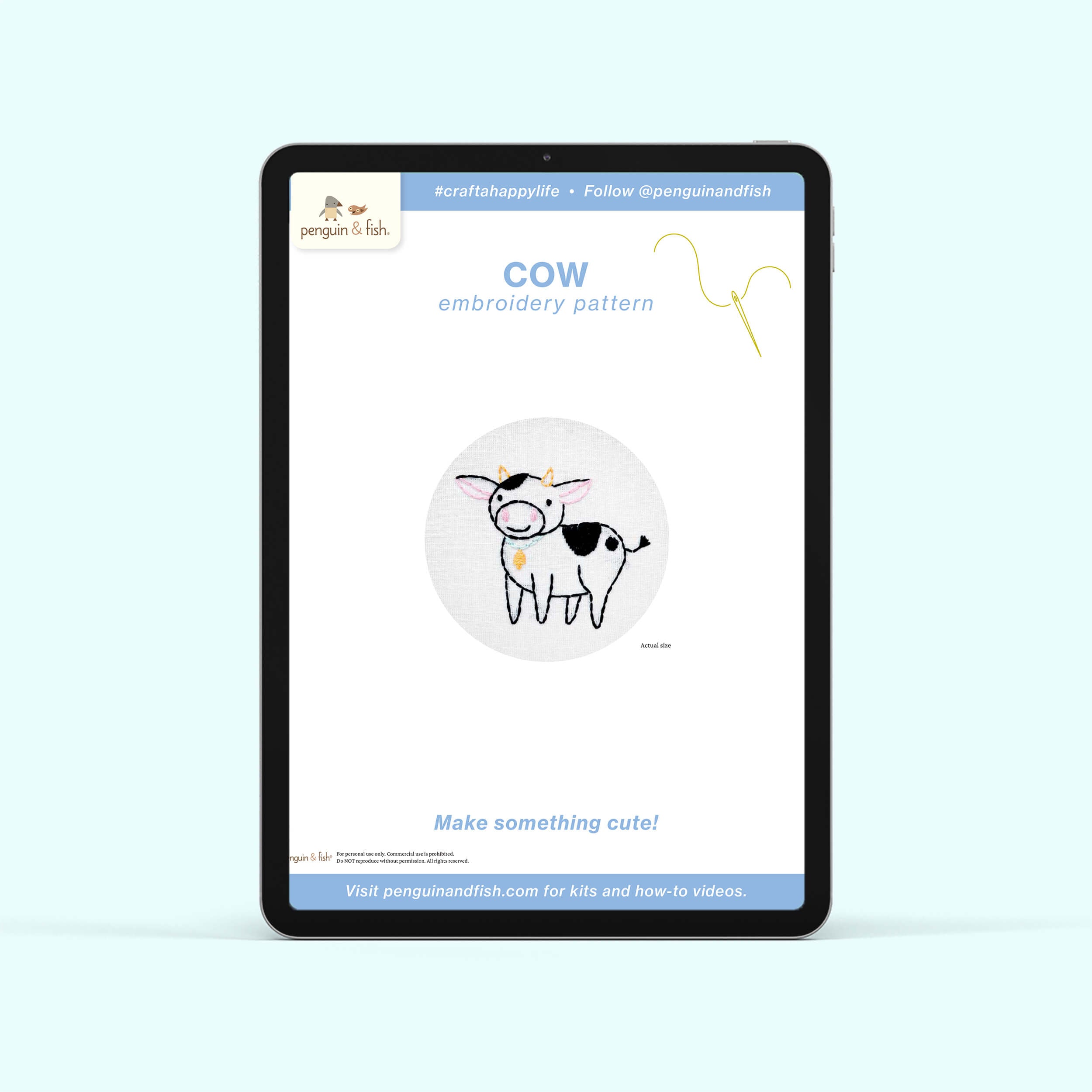 Cow PDF embroidery patttern shown on a tablet