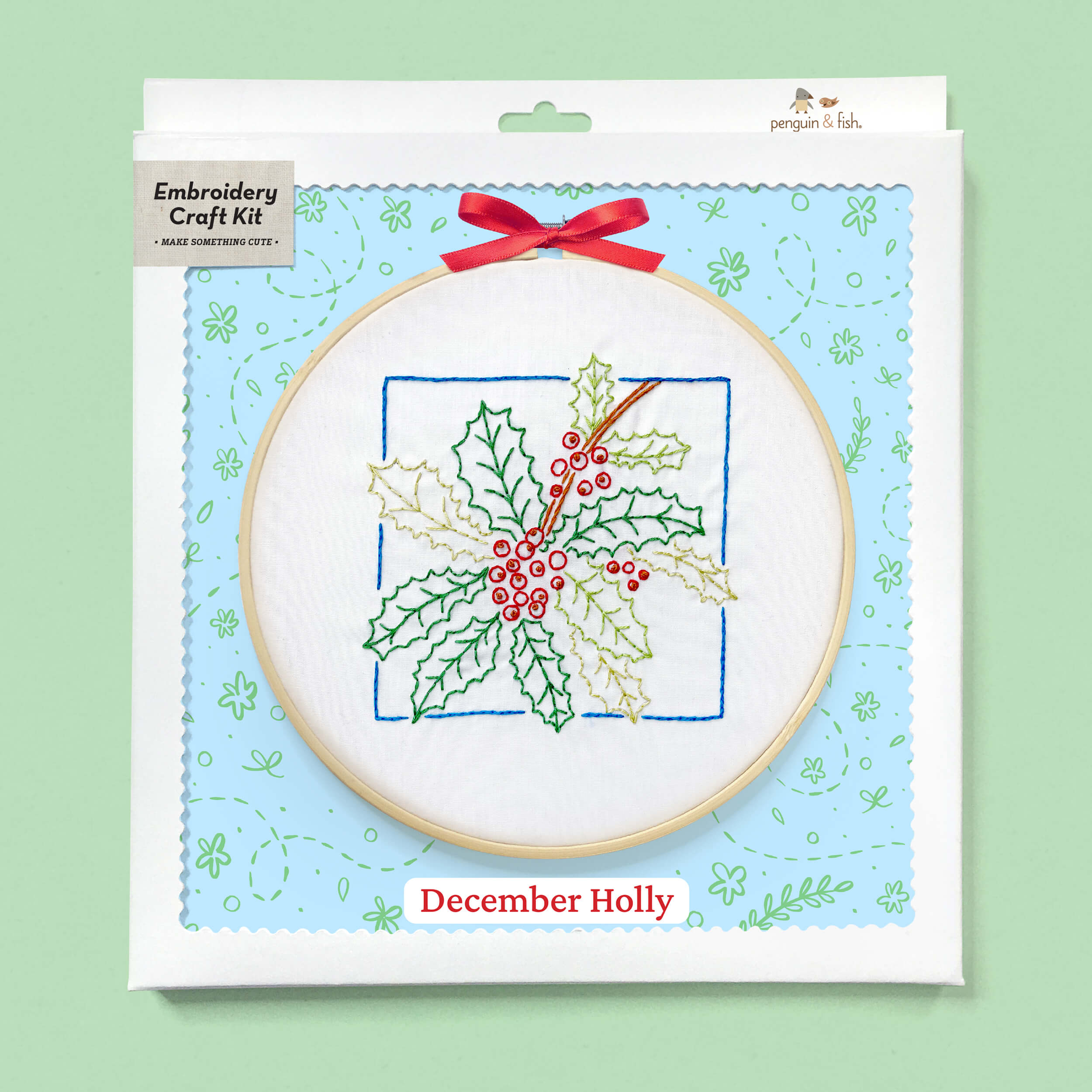 December Holly embroidery kit with supplies in a box