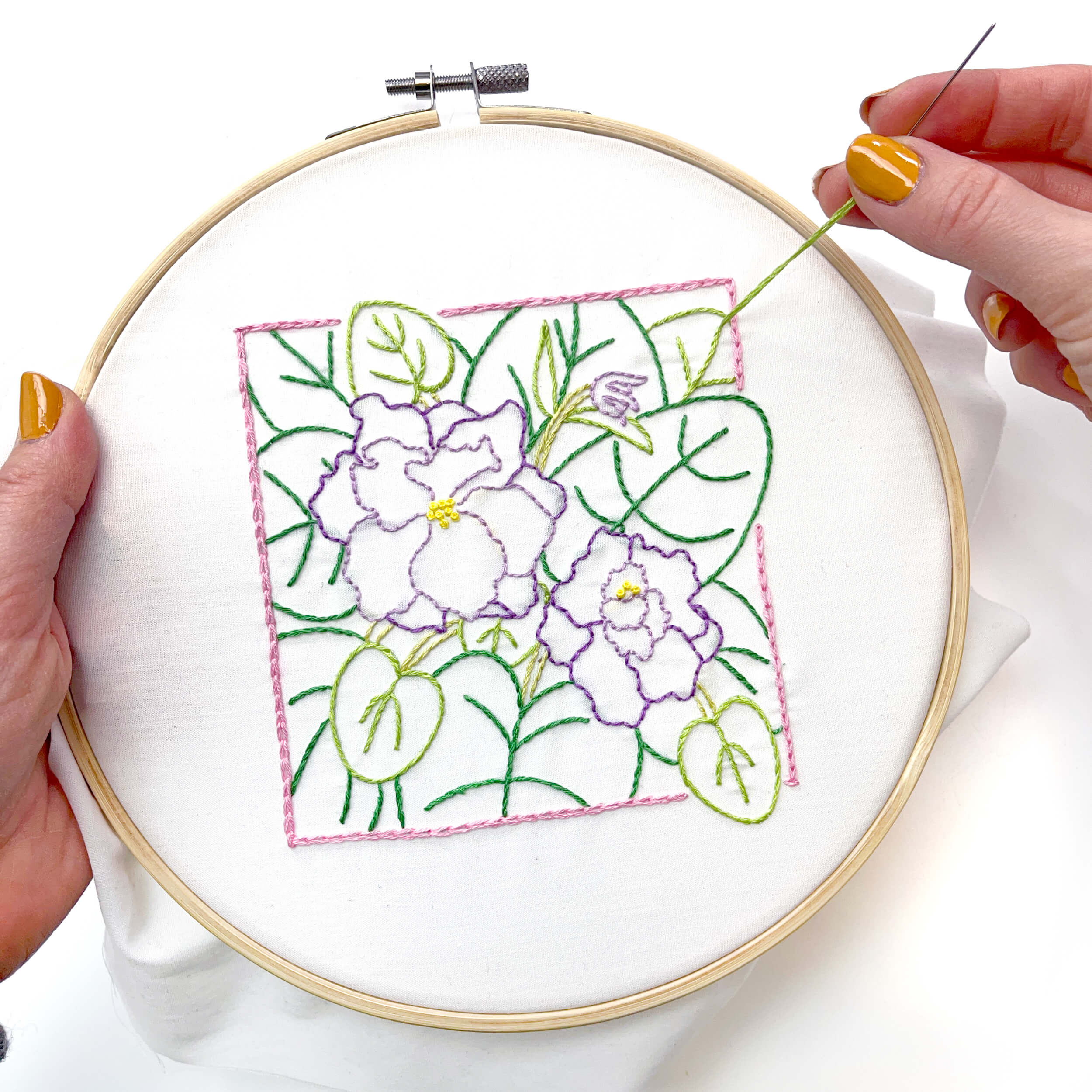 hand stitching the February Violet embroidery pattern