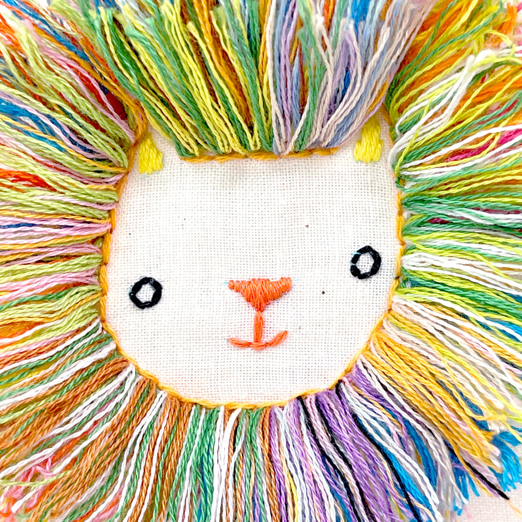 lion face with fluffy embroidery mane