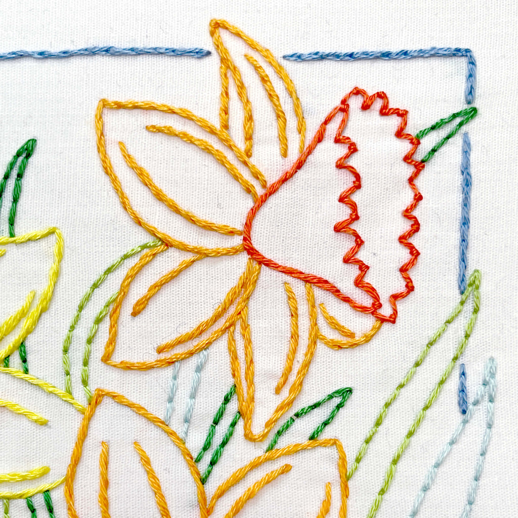 Close up of daffodil embroidered flower