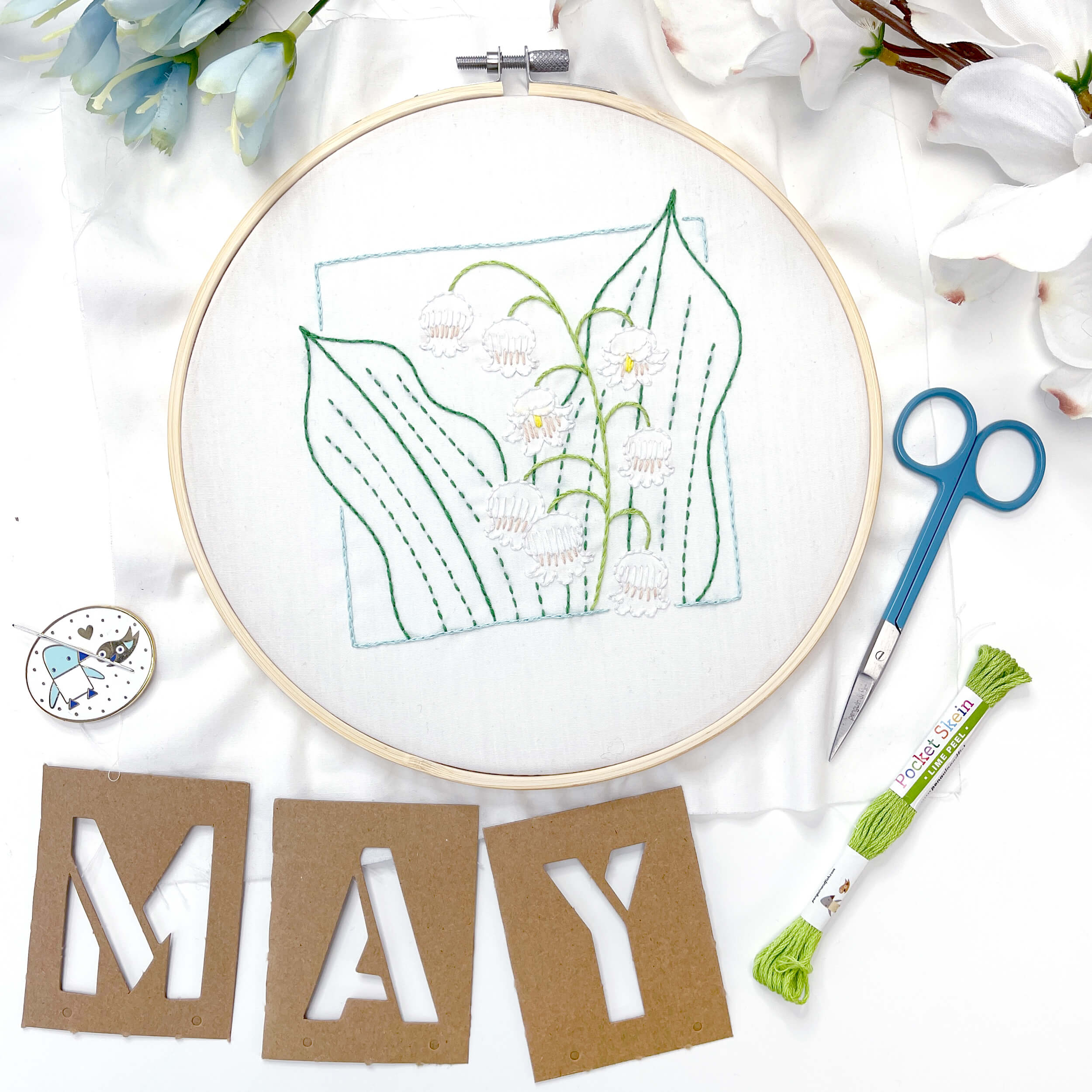 May Lily of the Valley finished embroidery in the hoop with letters MAY