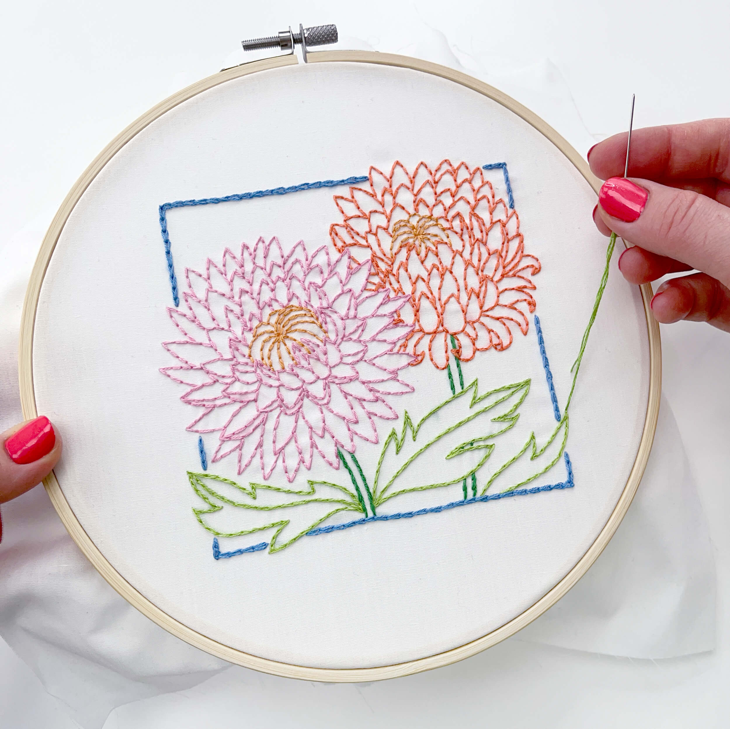 hand stitching the chrysanthemum embroidery flower