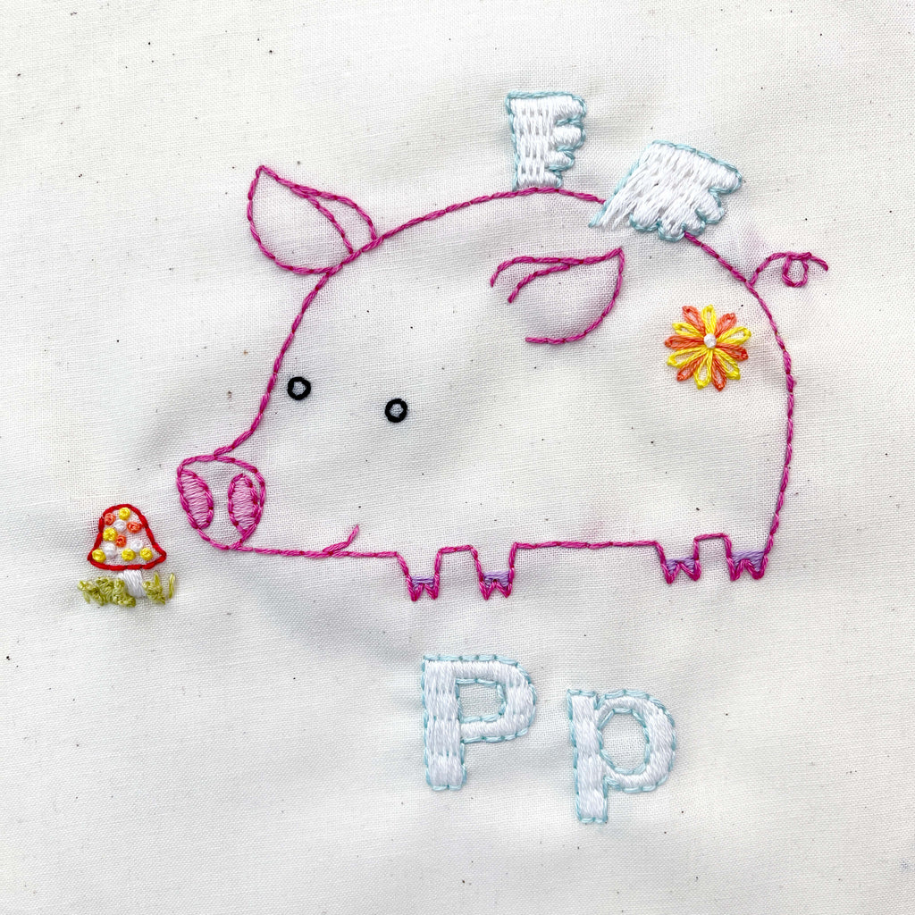 hand embroidered pig with wings and letters 'Pp'