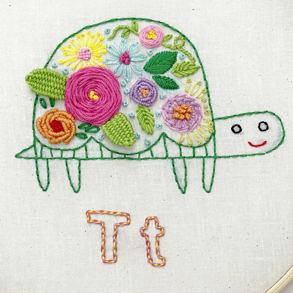 Turtle embroidery with flowers on shell