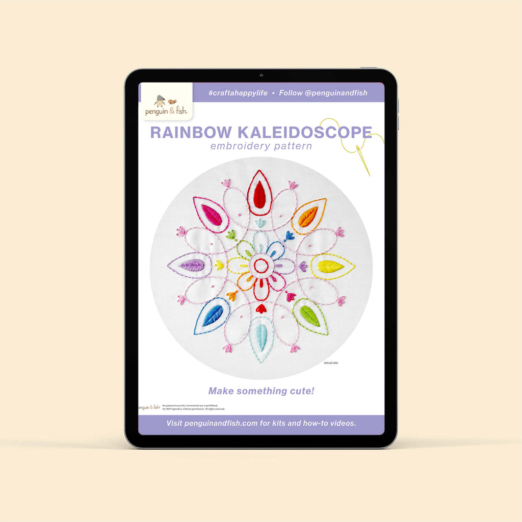 Rainbow Kaleidoscope embroidery pattern PDF shown on a tablet