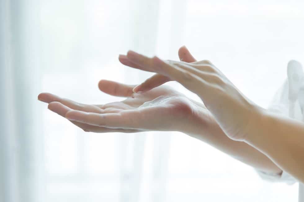 woman holds a jar with a cosmetic cream in her hands. skin care