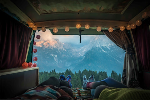 Vanlife with fairy lights and mountain views