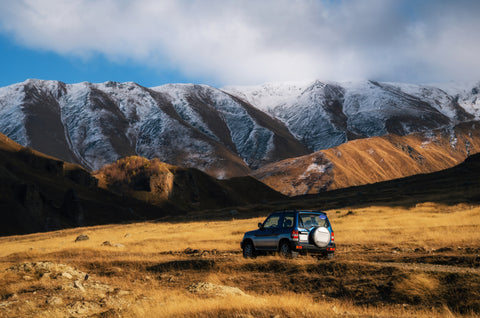 Off-road road trip with mountain backdrop