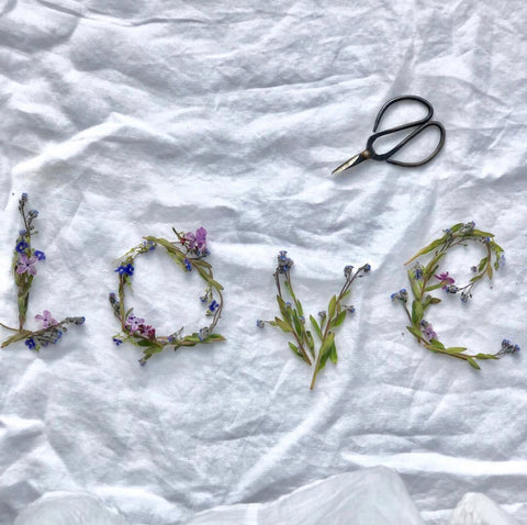 Fresh Flowers writing the word Love 