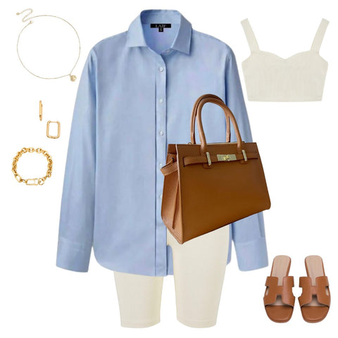 niebieska damska koszula oversize - skórzana torebka brązowa - biżuteria ze stali szlachetniej modna stylizacja na lato 2024