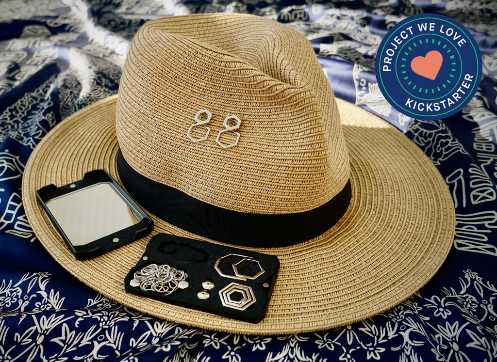 AIVIA Jewelry in Travel Case - open on hat. Featuring Kickstarter's Project We Love badge.