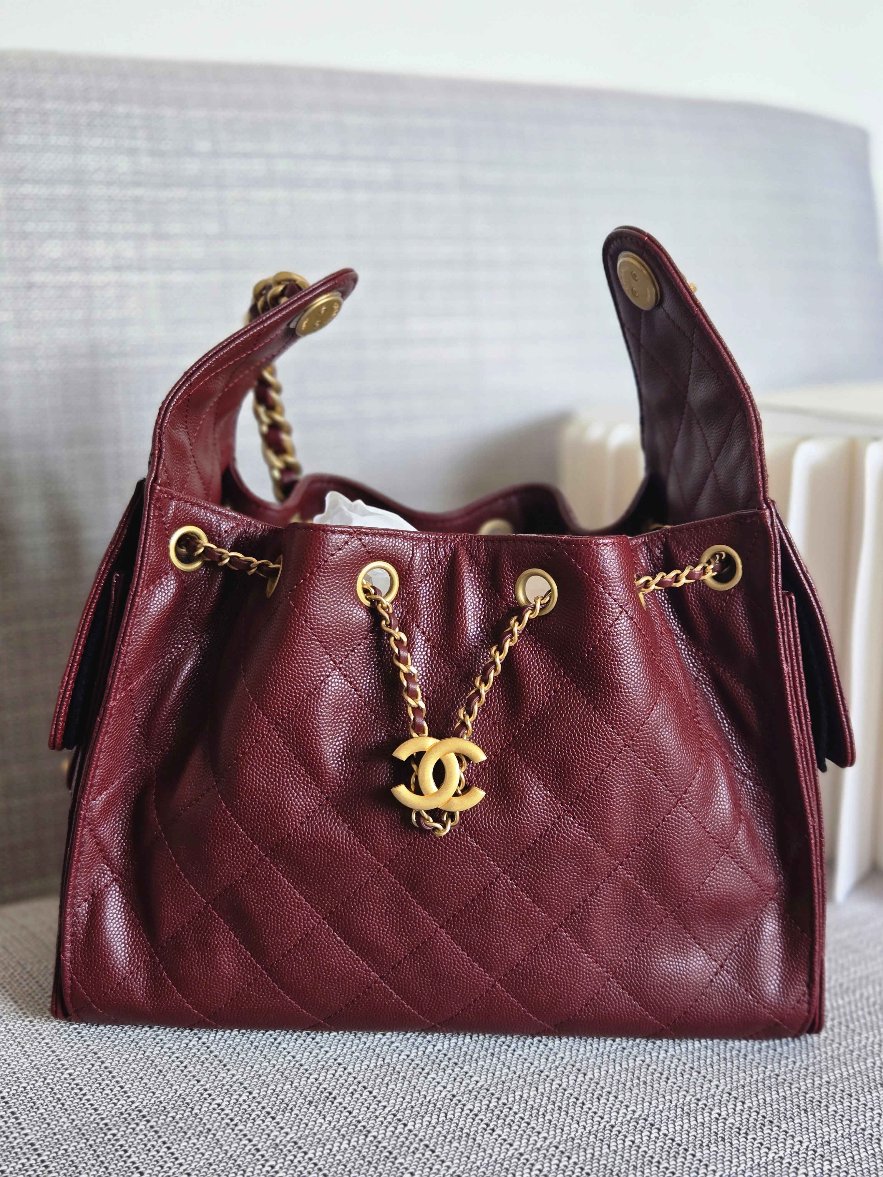 image of CHANEL 25 Size SMALL 25A 2025 Metiers d'art Collection BURGUNDY caviar aged GHW Hobo Bag