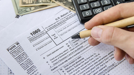 A person filling tax form