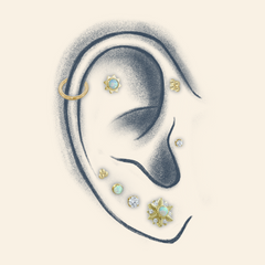 Drawn ear featuring 18K Gold gem ends