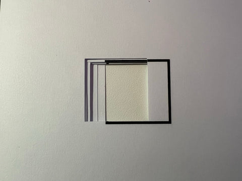 A photo of a badly cut square by a Cricut machine
