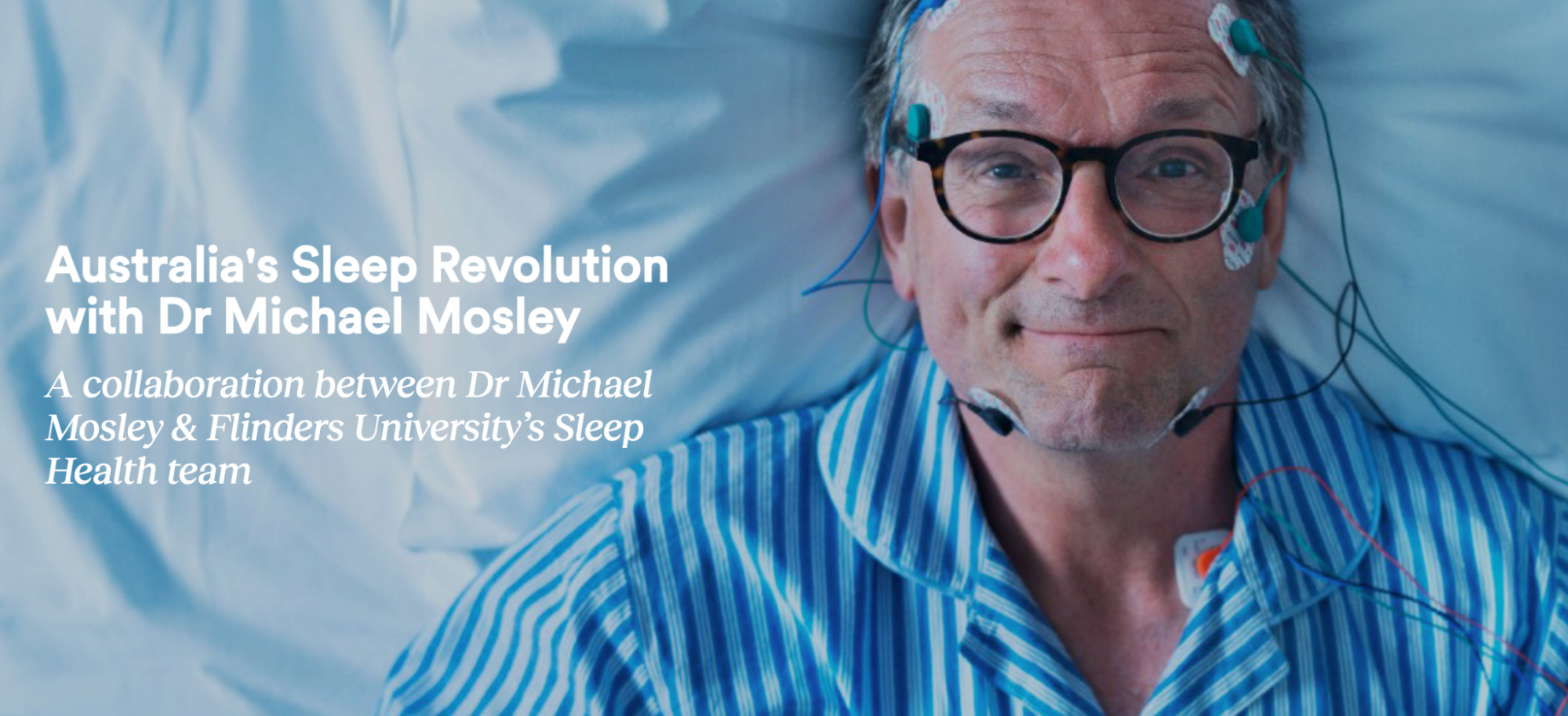 Image of Dr Michael Mosely with in pyjamas, lying in bed in the name of research and sleep testing