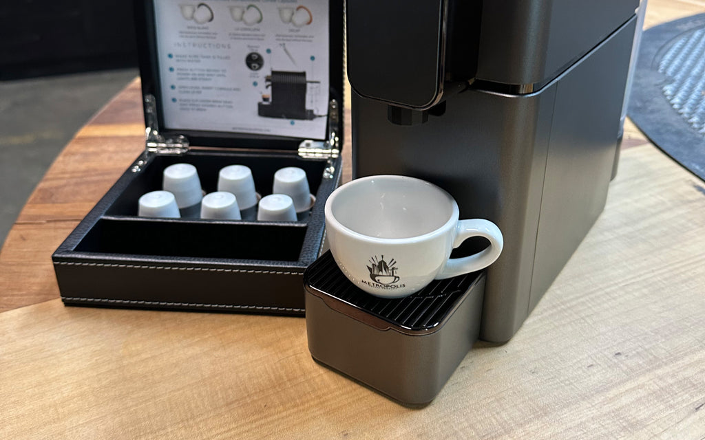 A coffee capsule machine specifically designed for Metropolis Coffee pods.