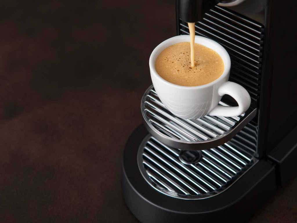A wholesale coffee capsule brewer makes espresso-style coffee.