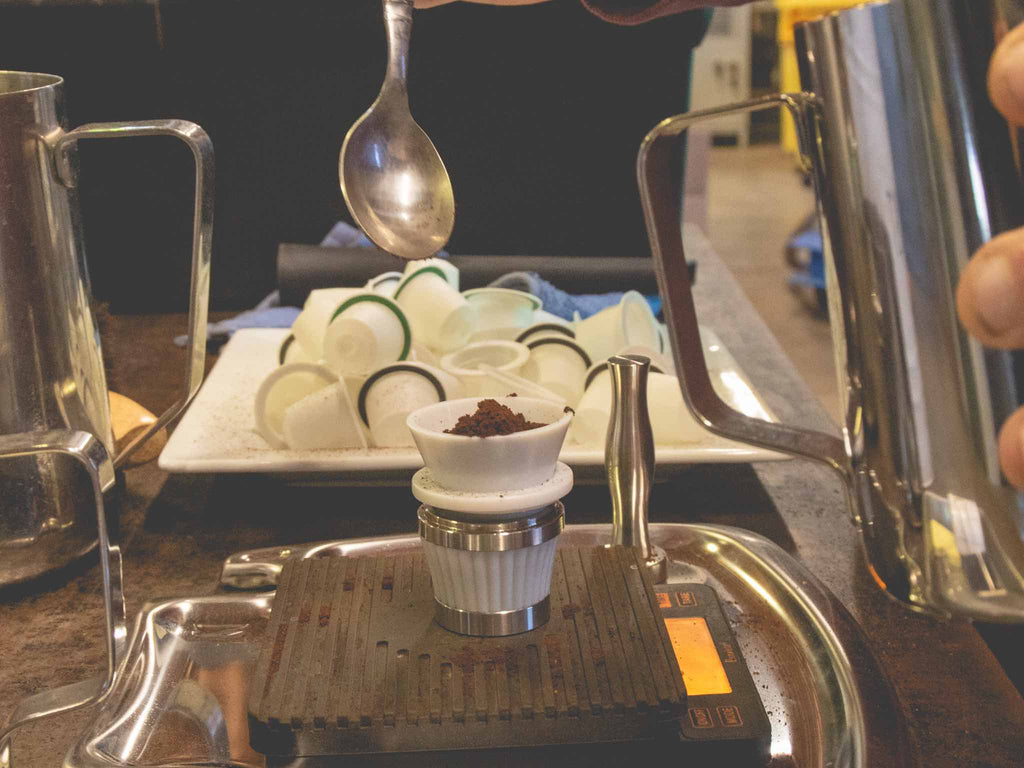 Testing the structural integrity of co-packing coffee capsules.