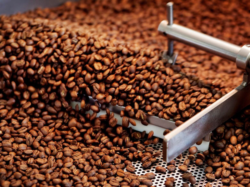 Roasting coffee beans for co-packing