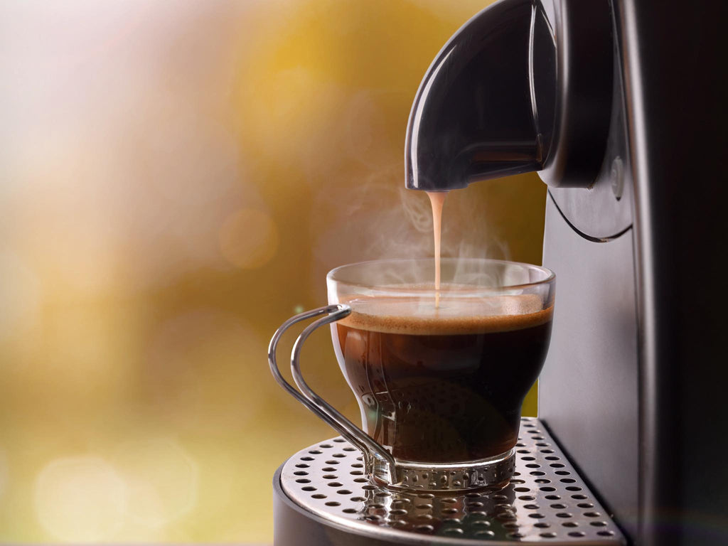 Brewing espresso-style coffee using Metropolis coffee capsules.