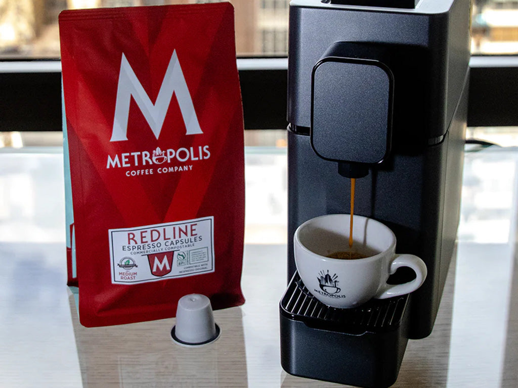 Brewing Metropolis Coffee Redline coffee capsules in a hotel room.