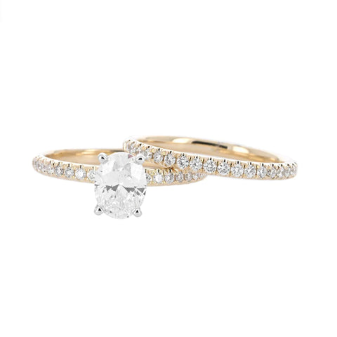THE SIGNATURE SOLITAIRE + PAVE DIAMONDS | 1.45CTW OVAL LAB GROWN BRIDAL SET | 14K YELLOW GOLD