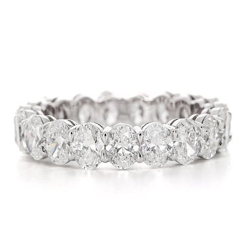 A 4.5 CTW white gold diamond eternity band featuring oval shaped diamonds