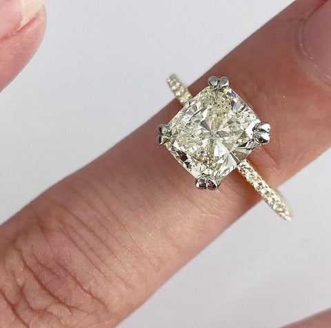 Image of cushion cut diamond engagement ring with double claw prongs | Buchroeders Jewelers