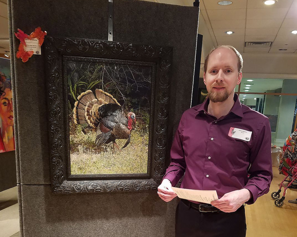 Joshua with Best of Show Award winning painting "Turkey in the Weeds"