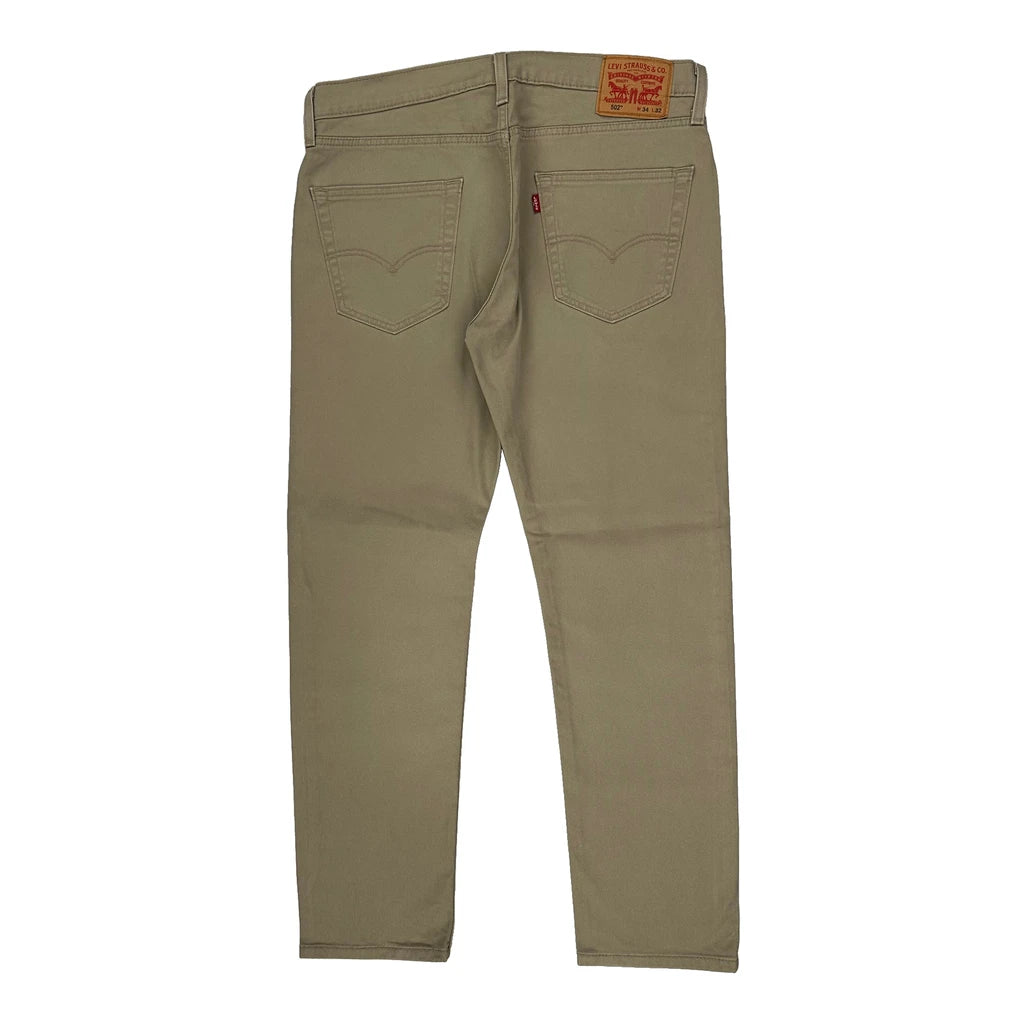 image of 502 Levis Trousers - 34W 30L Beige Cotton Blend