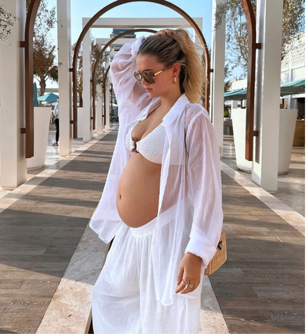 @mollymae styling this white mesh oversized shirt with a white bikini and matching mesh trousers.