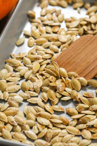 preparing pumpkin seeds to be roasted